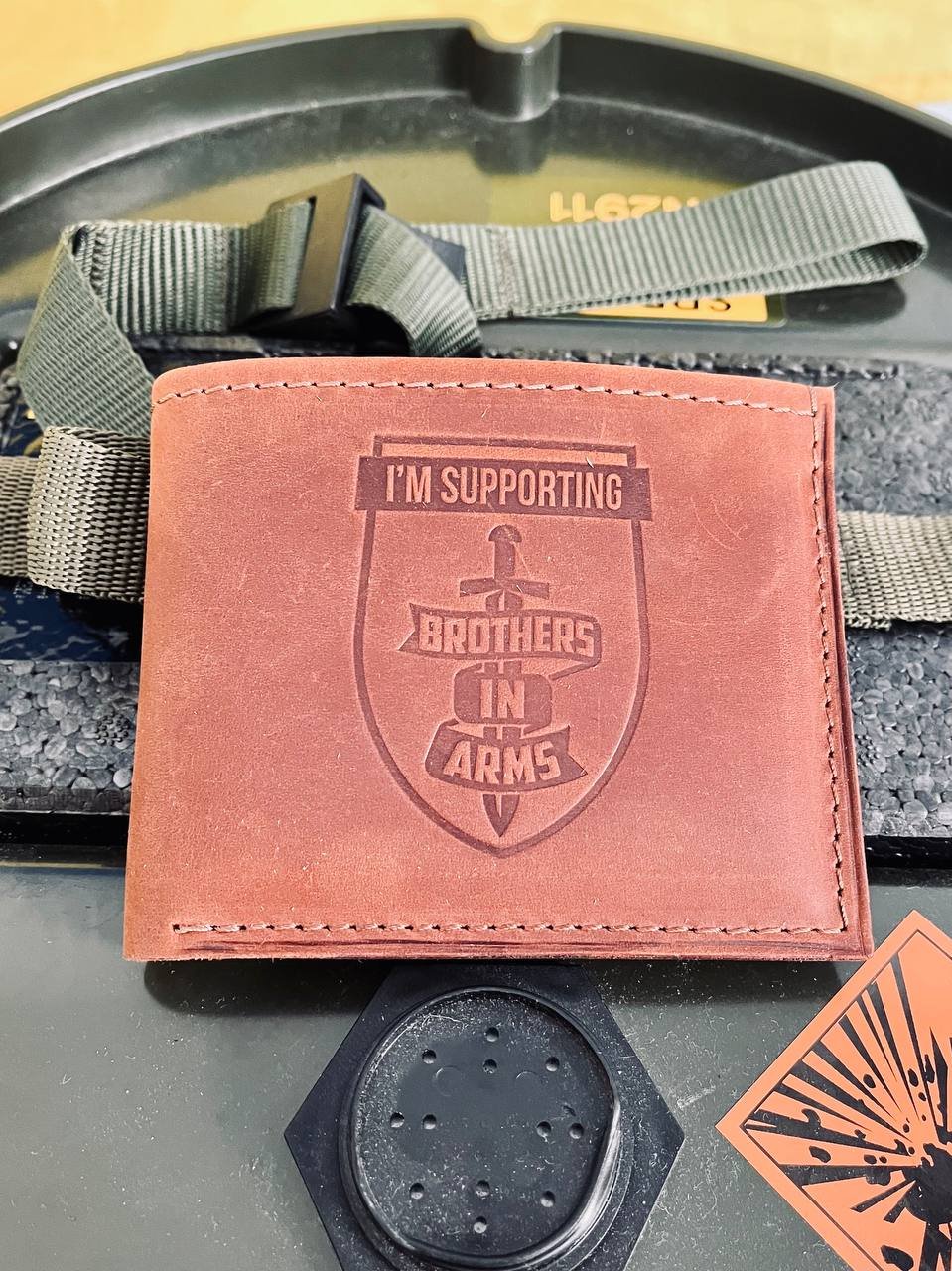 Leather  Wallet. I’m supporting Brothers in arms.
